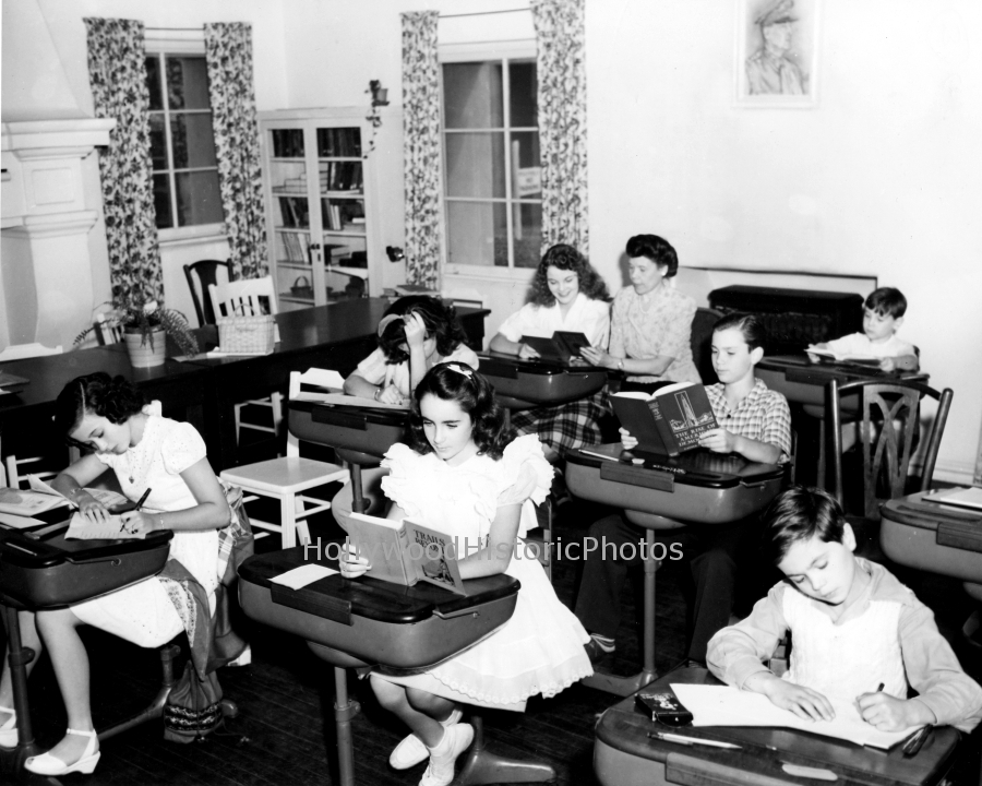 Elizabeth Taylor 1941 MGM Schoolhouse with 9 yr. old Elizabeth wm.jpg